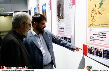 مجتبی امینی و مسعود نقاش زاده در مراسم افتتاح نمایشگاه عکس ۱+۴۰
